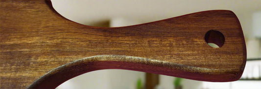 Natural wood serving board for pizza and snacks