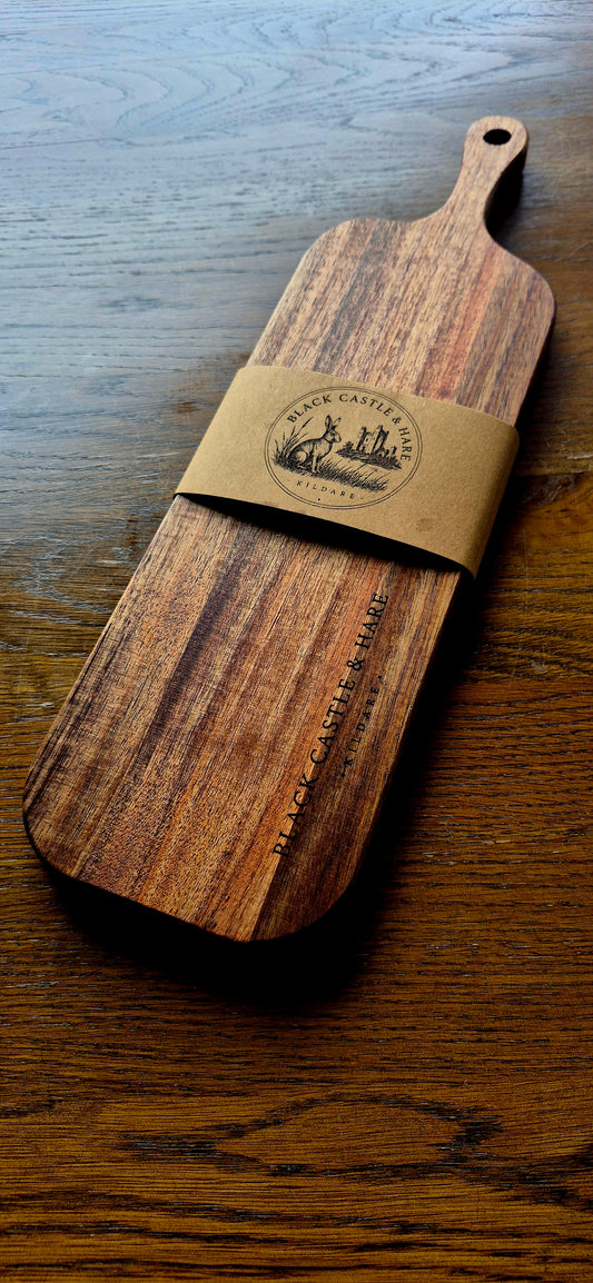 Close-up of Black Castle & Hare Kildare logo branded on food-safe double-oiled personal acacia wood serving board.
