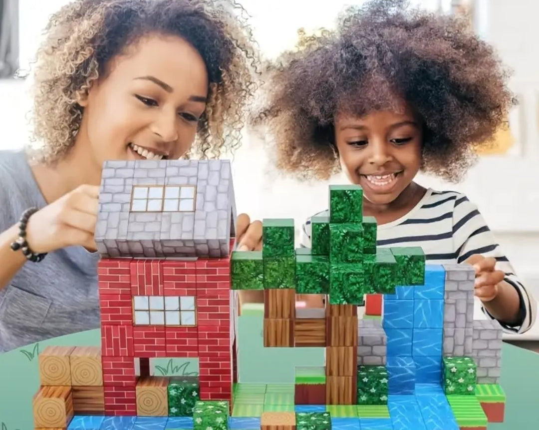Two children playing with magnetic building set