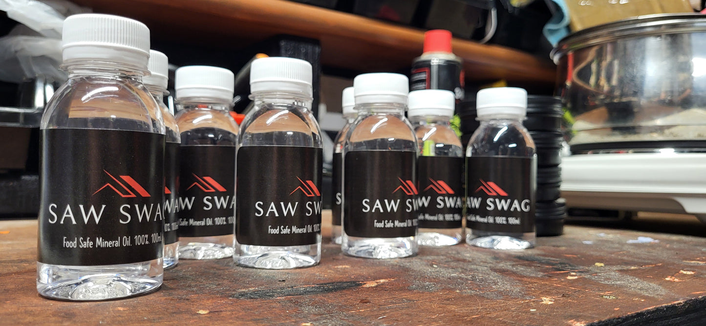 Applying SawSwag mineral oil to a wooden chopping board