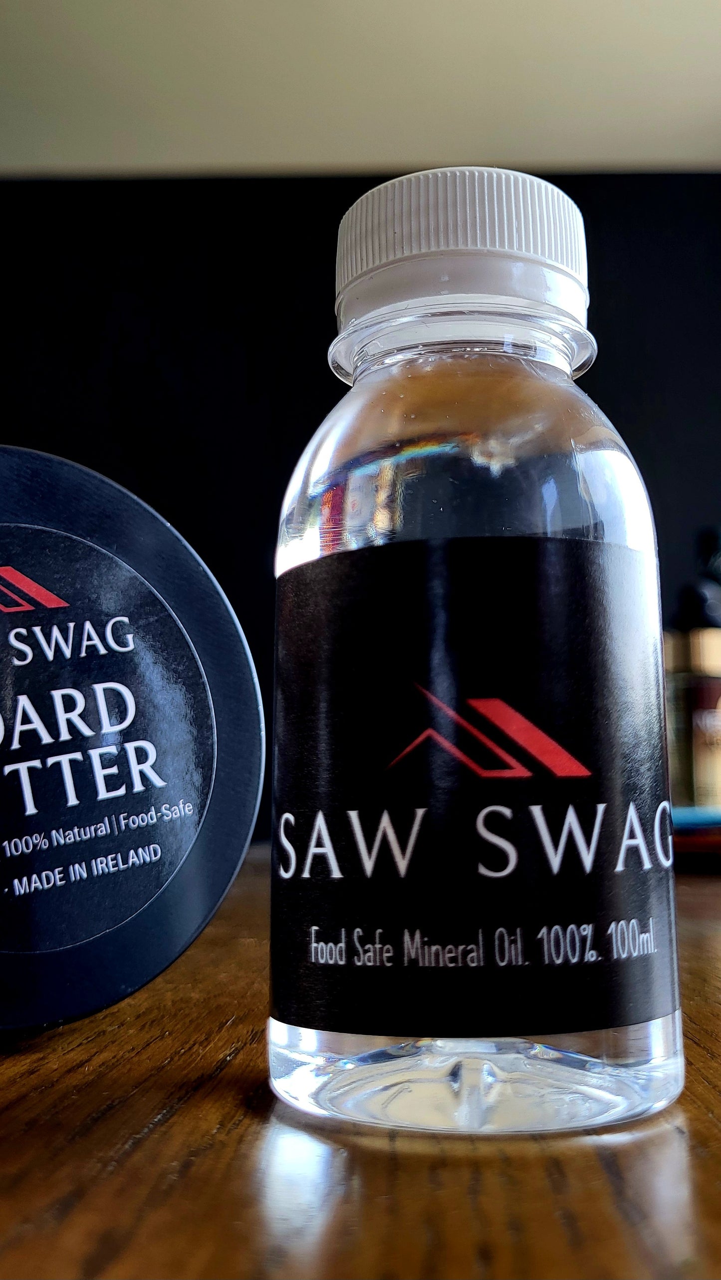 SawSwag 100ml bottle of food-safe mineral oil for wooden chopping boards