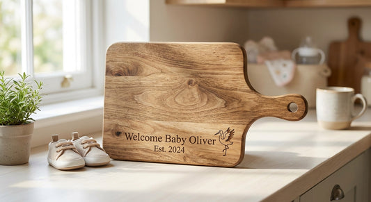 Personalised chopping boards for a new baby announcement