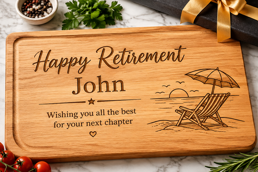 Personalised wooden chopping board for a retirement gift with a "Happy Retirement" message with a beach scene engraved on the face