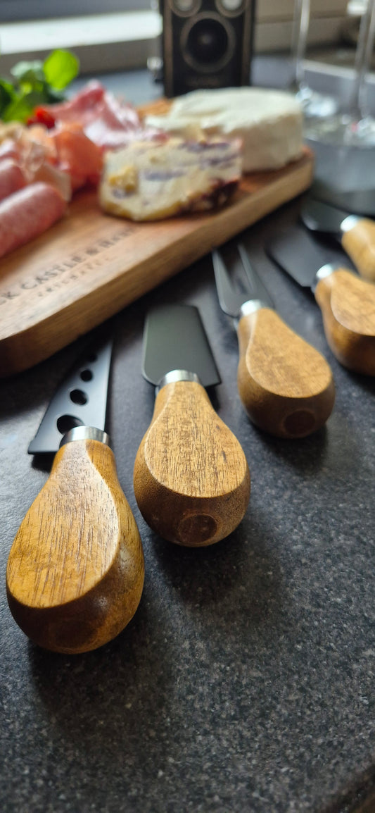 Complete 6-piece cheese and meat knife set laid out flat, an ideal accessory for wooden charcuterie and serving boards in Ireland