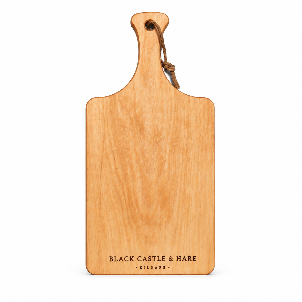 A rectangular wooden serving board with a rounded handle and a hanging loop, shown on a plain white background. The board is light natural wood with the engraved text 'BLACK CASTLE & HARE' and smaller 'KILDARE' at the bottom.