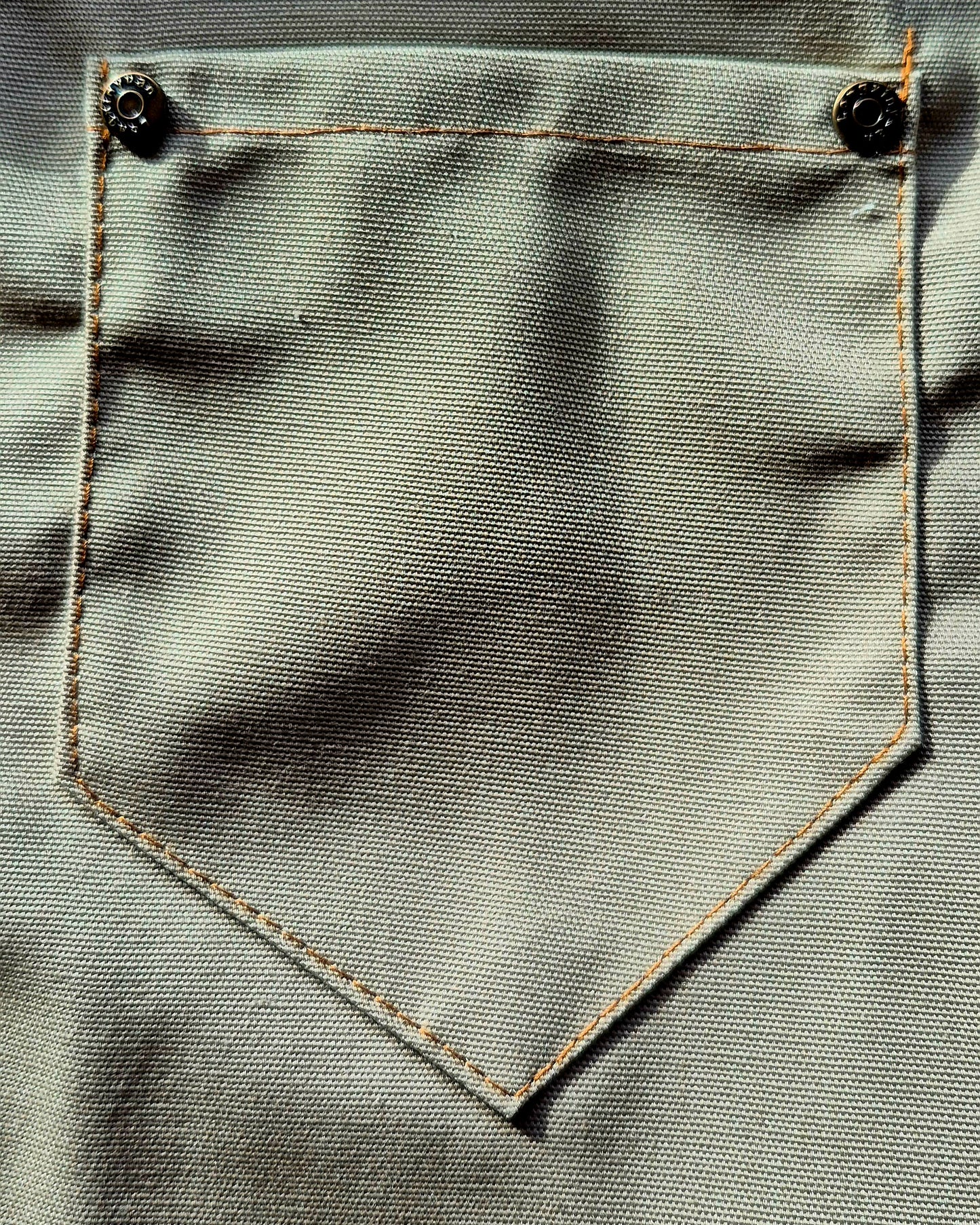 Close up of apron small pocket
