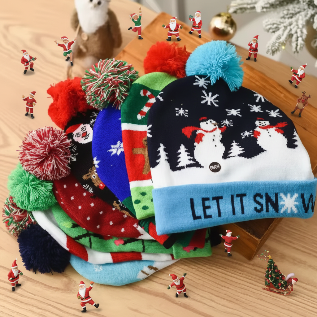 Stack of colorful beanies with pom-poms on a wooden surface