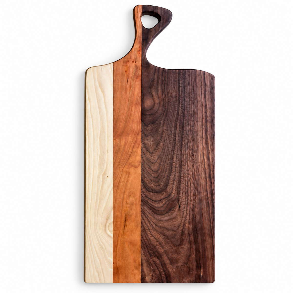 A rectangular wooden serving board with a handle, featuring three vertical wood grain sections: a light natural wood on the left, a medium warm wood in the middle, and a dark brown wood on the right.
