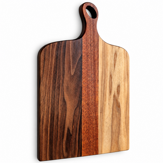 A rectangular wooden serving board with a rounded handle and a built-in cutout, featuring a horizontal three-tone wood grain pattern in light tan, medium reddish-brown, and dark brown on a white background.