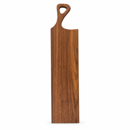 A rectangular wooden serving board with a rounded handle cutout at the top, featuring a rich medium-brown wood grain pattern, shown against a plain white background.