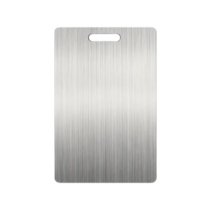 A rectangular stainless steel cutting board with a brushed metal finish and a cutout handle at the top, shown on a plain white background.