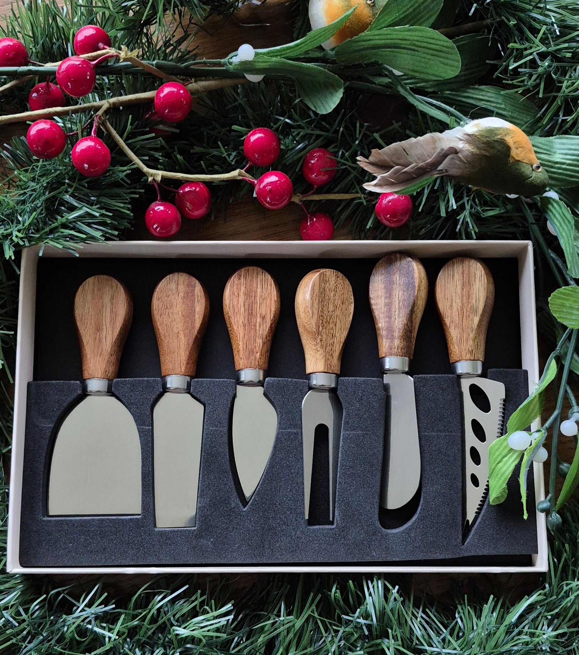 Complete six‑piece cheese knife set with stainless steel blades and wood handles