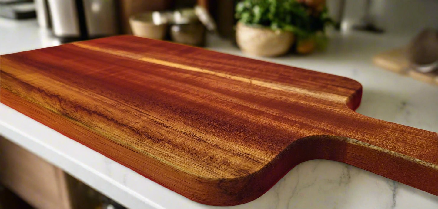 Elegant hardwood serving platter treated with professional Saw Swag mineral oil.