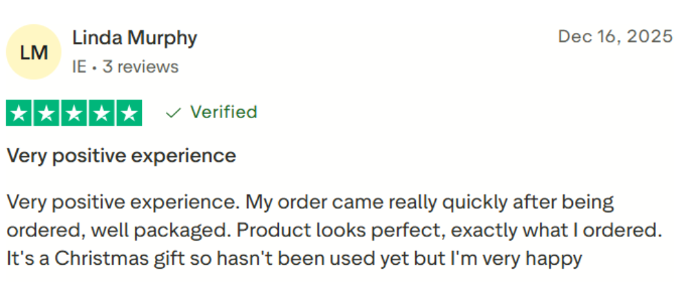 A customer review card showing a verified five-star review by Linda Murphy. The review text is positive, stating a very happy Christmas gift experience with quick shipping and a well-packaged product.