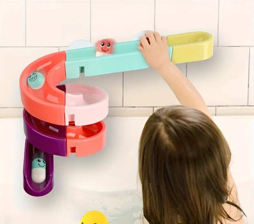 Children's bathtub water slide showing the flow of water through tracks.
