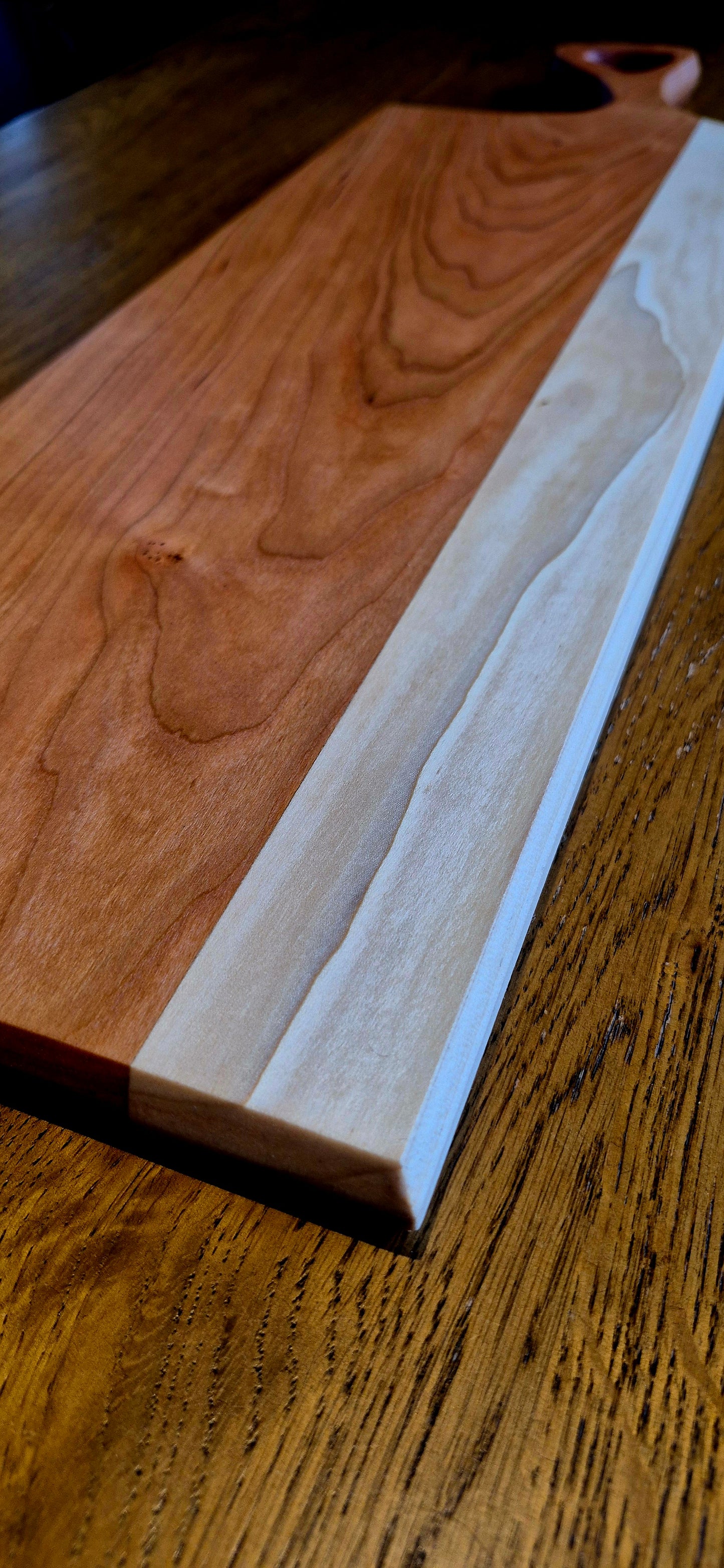 Extra-long handcrafted grazing board made from light Maple and Poplar wood, measuring 595mm in length.