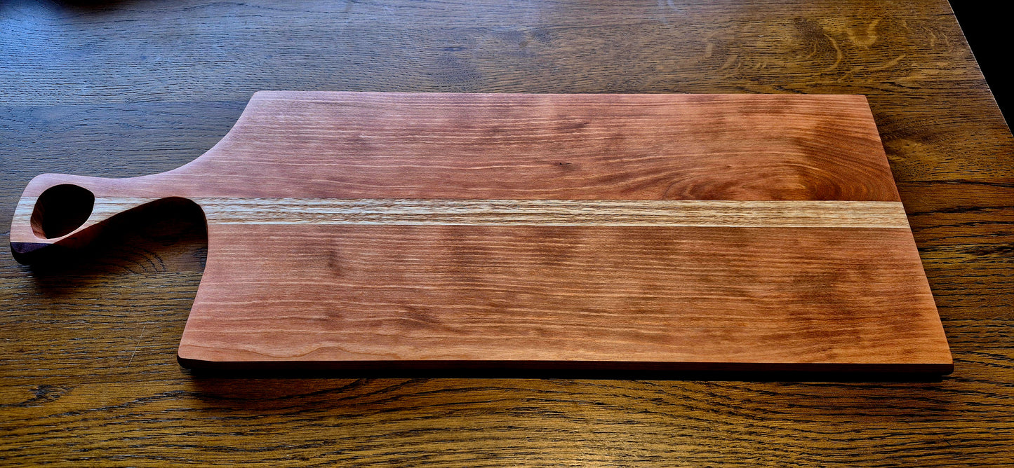 A side profile shot of the 20mm thick hardwood board, showing the smooth hand-sanded edges and oil finish