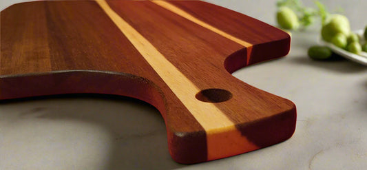 Modern style wooden serving board on marble countertop